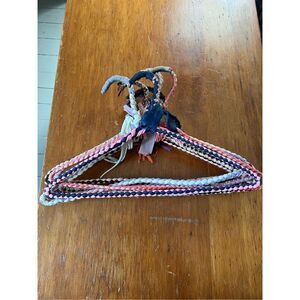 Bundle of vintage woven multicolor hangers